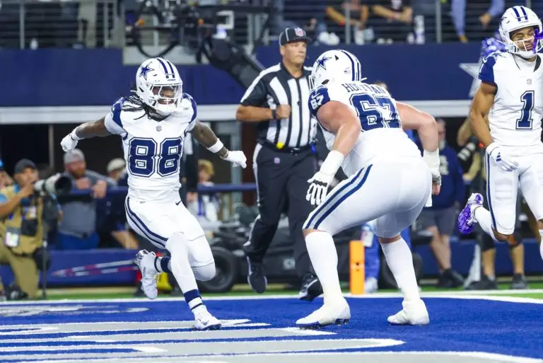 Dec 9, 2024; Arlington, Texas, USA; Dallas Cowboys wide receiver CeeDee Lamb (88) celebrates with Dallas Cowboys center Brock Hoffman (67) after scoring a touchdown during the first half at AT&T Stadium. Mandatory Credit: Kevin Jairaj-Imagn Images