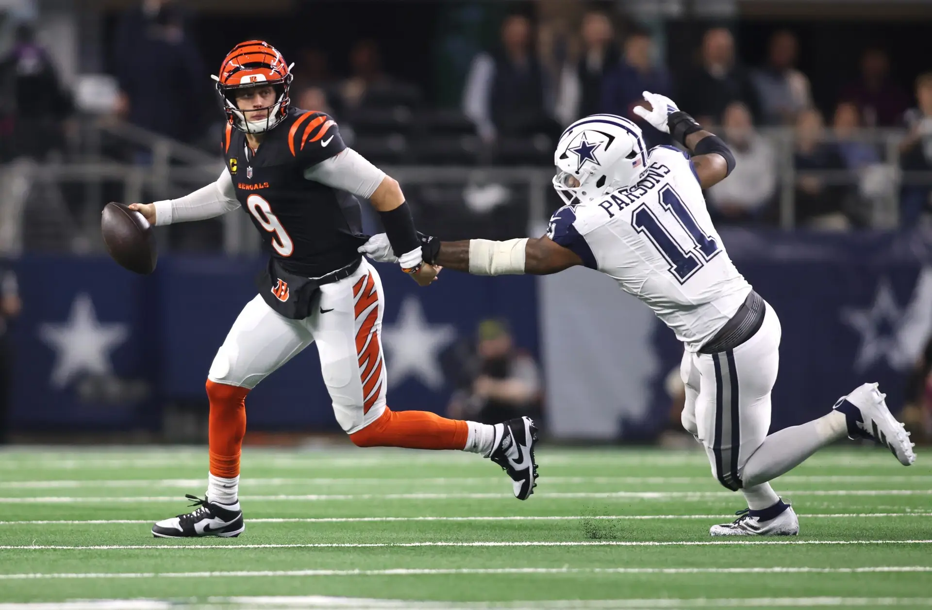 "They've Been Hooking Up" Bengals' QB Joe Burrow Officially Announces Girlfriend 3 Dec 9, 2024; Arlington, Texas, USA; Cincinnati Bengals quarterback Joe Burrow (9) avoids the tackle of Dallas Cowboys linebacker Micah Parsons (11) in the second half at AT&T Stadium. Mandatory Credit: Tim Heitman-Imagn Images