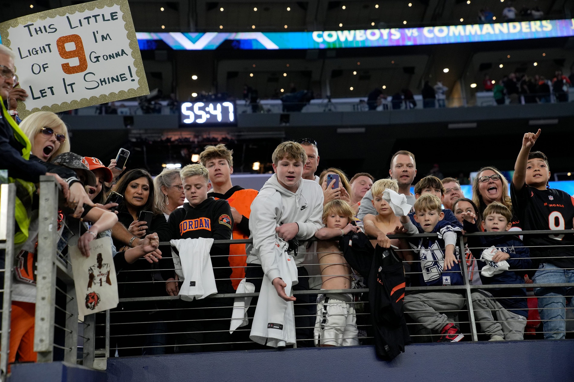 Football fans try to get the attention of Cincinnati Bengals quarterback Joe Burrow after the Bengals beat the Dallas Cowboys 27-20 during Monday Night Football at AT&T Stadium in Arlington, Texas on Monday, December 9, 2024. © Cara Owsley/The Enquirer / USA TODAY NETWORK via Imagn Images