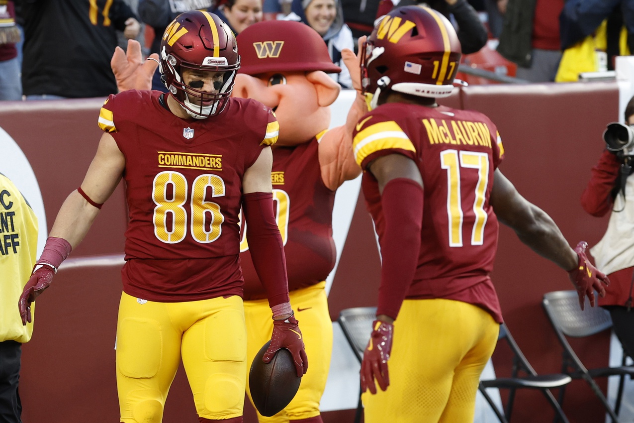 Nov 24, 2024; Landover, Maryland, USA; Washington Commanders tight end Zach Ertz (86) celebrates with Commanders wide receiver Terry McLaurin (17) after catching a touchdown pass against the Dallas Cowboys at Northwest Stadium. Mandatory Credit: Geoff Burke-Imagn Images