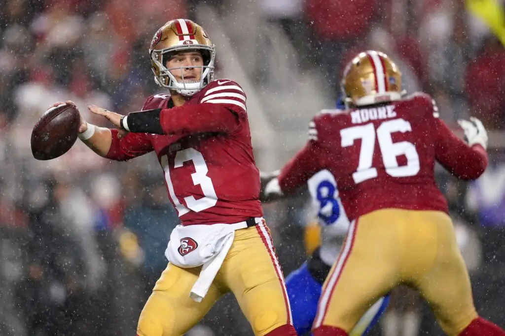 Dec 12, 2024; Santa Clara, California, USA; San Francisco 49ers quarterback Brock Purdy (13) throws a pass against the Los Angeles Rams in the second quarter at Levi's Stadium. Mandatory Credit: Cary Edmondson-Imagn Images