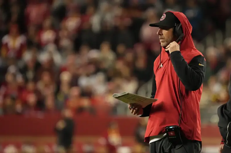 Dec 12, 2024; Santa Clara, California, USA; San Francisco 49ers head coach Kyle Shanahan on the sideline against the Los Angeles Rams during the fourth quarter at Levi's Stadium. Mandatory Credit: Kelley L Cox-Imagn Images