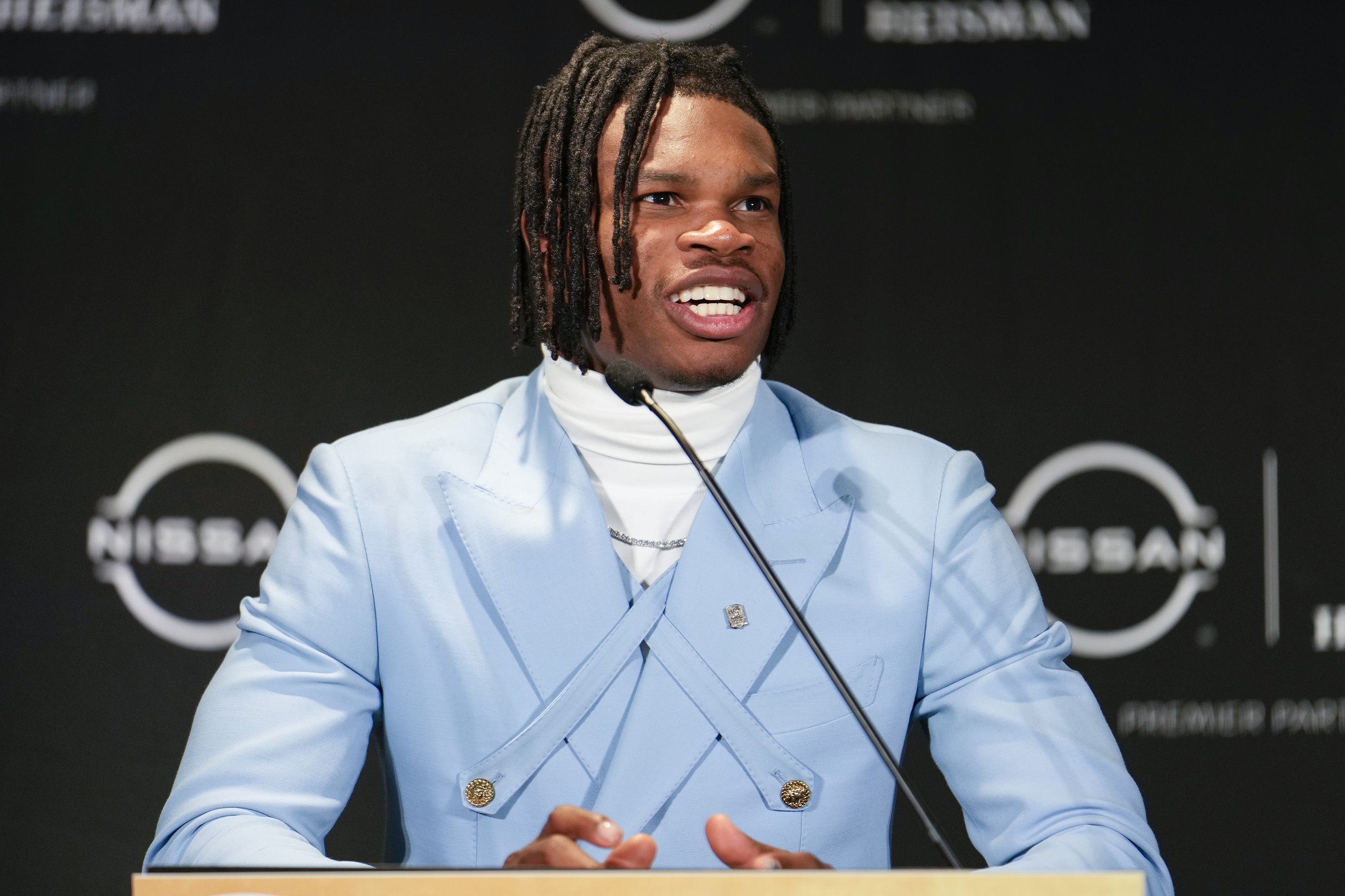 Dec 14, 2024; New York, NY, USA; Colorado Buffaloes wide receiver/cornerback Travis Hunter speaks to the press after winning the 2024 Heisman Trophy. Mandatory Credit: Lucas Boland-Imagn Images