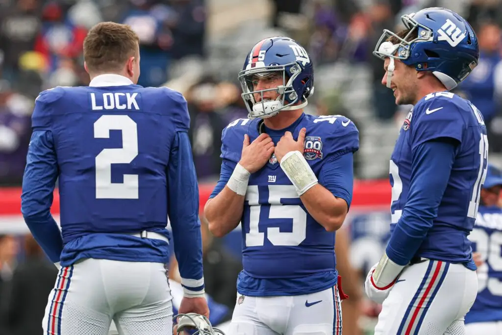 New York Giants quarterback Tommy DeVito (15) and quarterback Drew Lock (2)