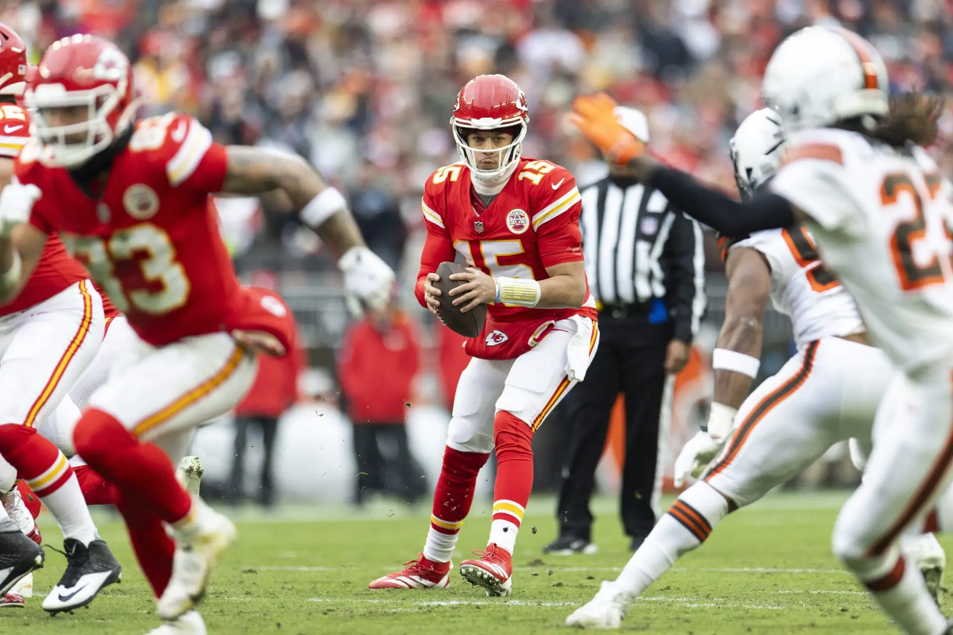 Dec 15, 2024; Cleveland, Ohio, USA; Kansas City Chiefs quarterback Patrick Mahomes (15) drops back to pass against the Cleveland Browns during the first quarter at Huntington Bank Field. Mandatory Credit: Scott Galvin-Imagn Images