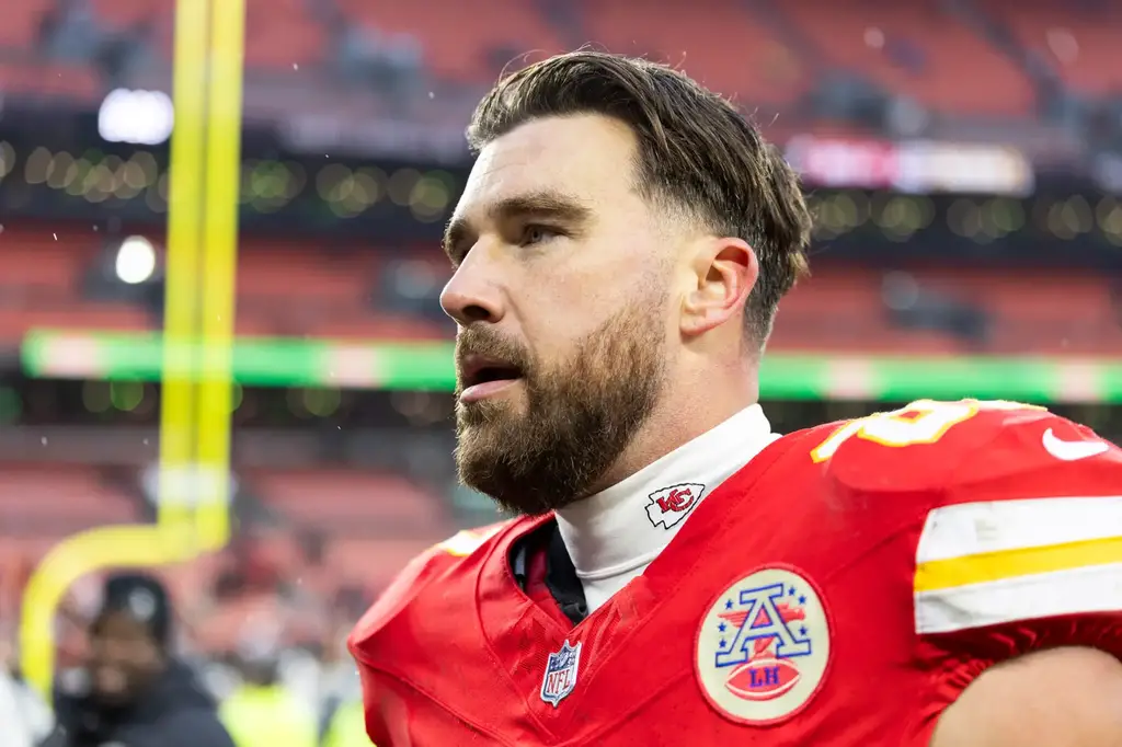 Dec 15, 2024; Cleveland, Ohio, USA; Kansas City Chiefs tight end Travis Kelce (87) walks to the locker room following a game against the Cleveland Browns at Huntington Bank Field. Mandatory Credit: Scott Galvin-Imagn Images