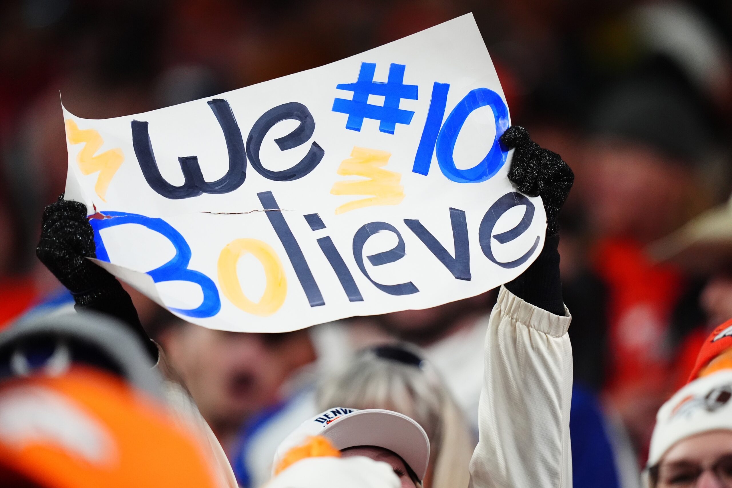 Dec 15, 2024; Denver, Colorado, USA; Denver Broncos fan holds a sign in reference to quarterback Bo Nix (10) (not pictured) in the fourth quarter against the Indianapolis Colts at Empower Field at Mile High. Mandatory Credit: Ron Chenoy-Imagn Images