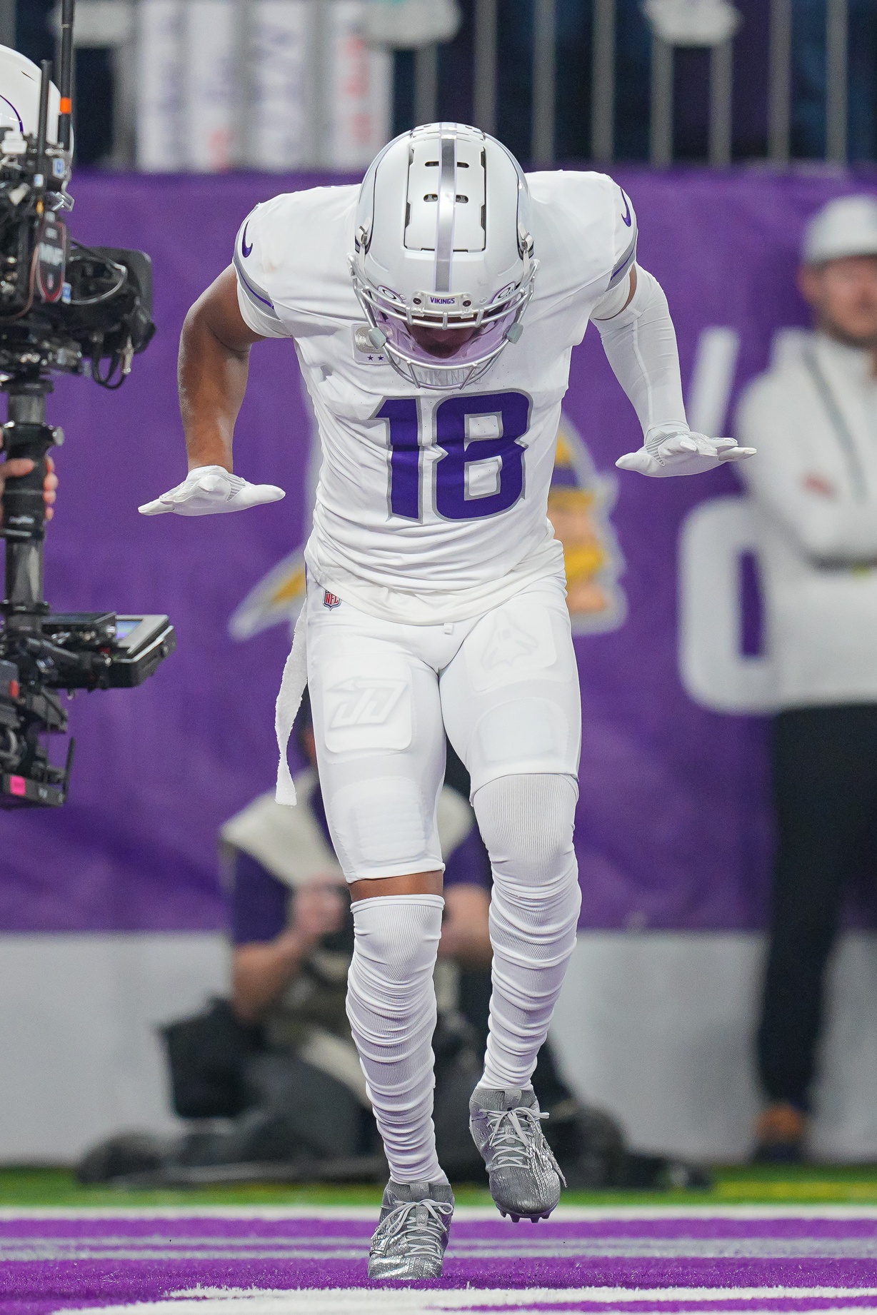 Dec 16, 2024; Minneapolis, Minnesota, USA; Minnesota Vikings wide receiver Justin Jefferson (18) celebrates his touchdown against the Chicago Bears in the first quarter at U.S. Bank Stadium. Mandatory Credit: Brad Rempel-Imagn Images