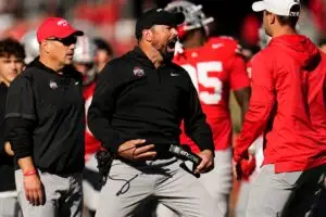 Ohio State Buckeyes head coach Ryan Day and linebacker Arvell Reese