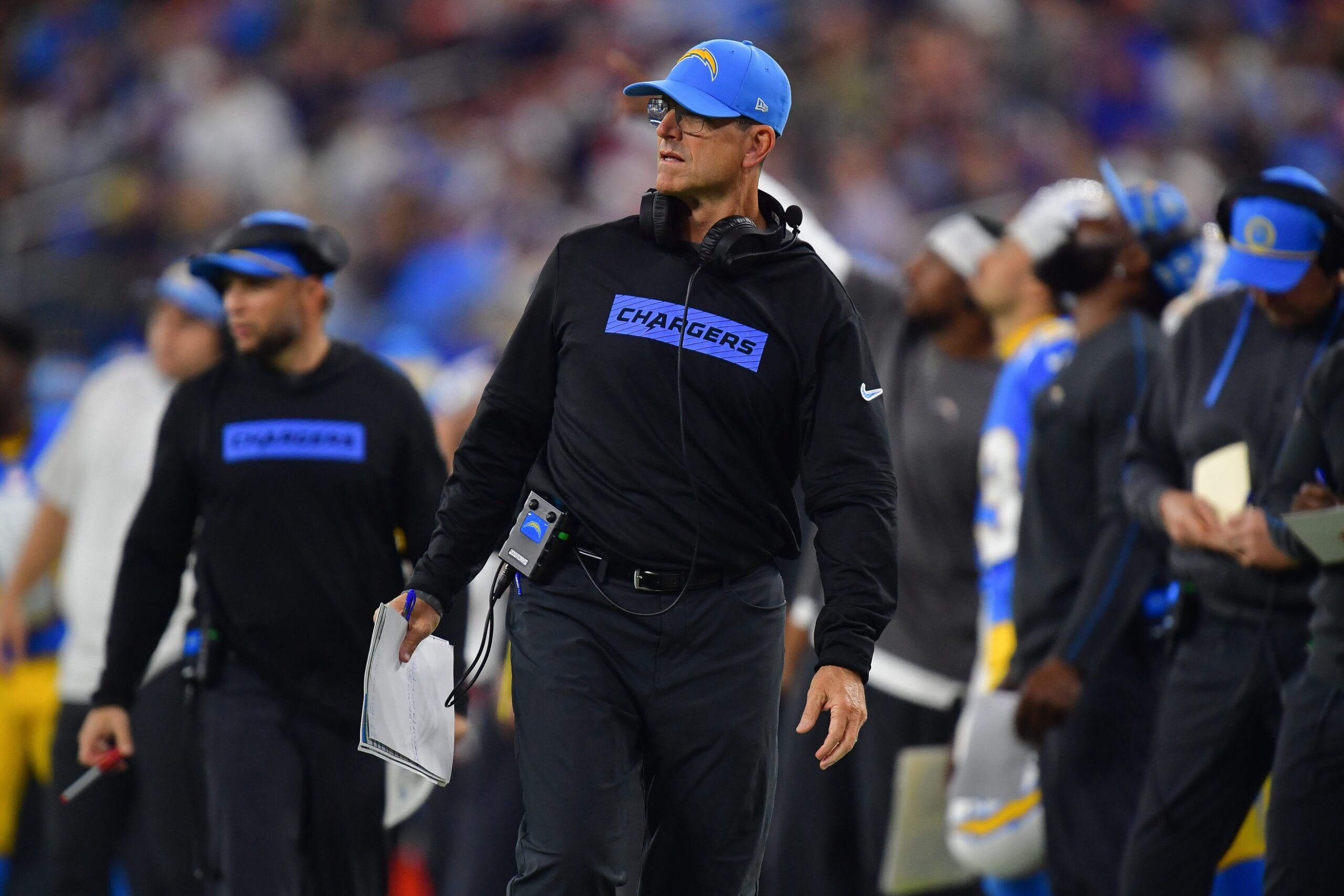 Dec 19, 2024; Inglewood, California, USA; Los Angeles Chargers head coach Jim Harbaugh watches game action against the Denver Broncos during the first half at SoFi Stadium. Mandatory Credit: Gary A. Vasquez-Imagn Images