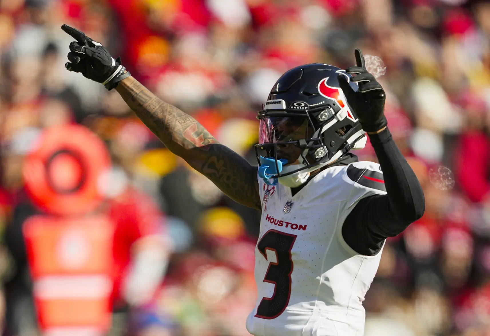 Dec 21, 2024; Kansas City, Missouri, USA; Houston Texans wide receiver Tank Dell (3) celebrates after a play during the first half against the Kansas City Chiefs at GEHA Field at Arrowhead Stadium. Mandatory Credit: Jay Biggerstaff-Imagn Images