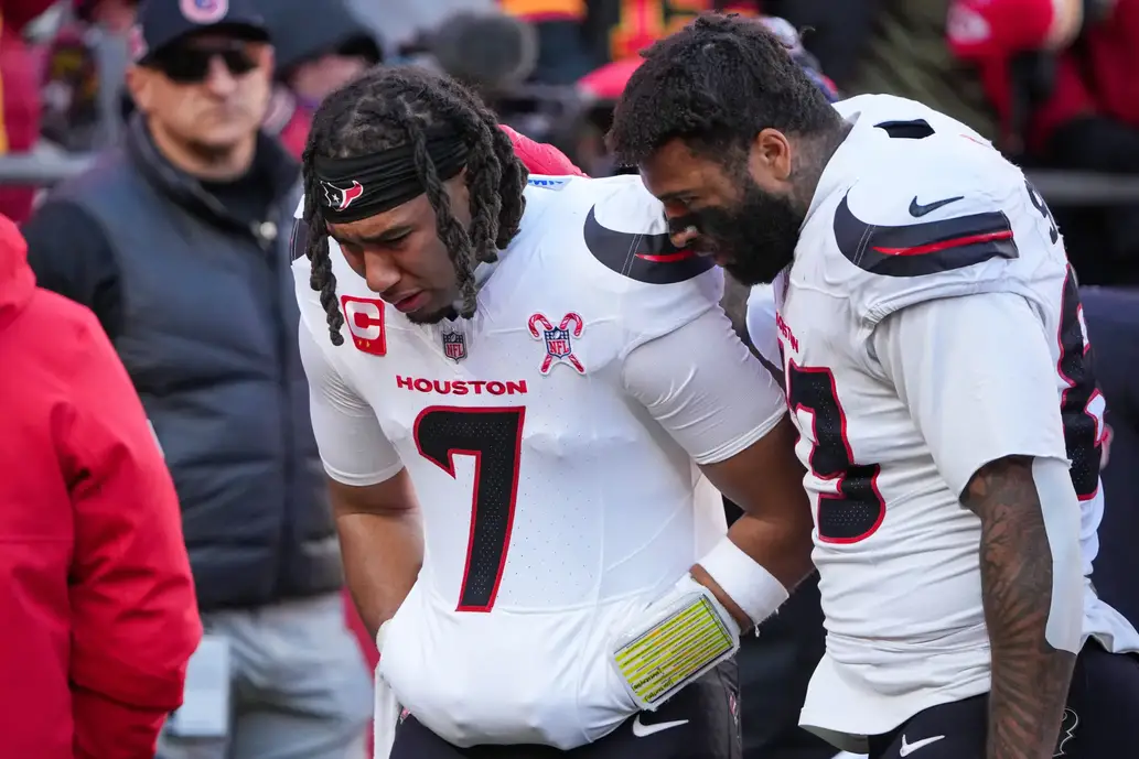 Dec 21, 2024; Kansas City, Missouri, USA; Houston Texans quarterback C.J. Stroud (7) shows concern for injured wide receiver Tank Dell (3) (not pictured) during the second half of the game against the Kansas City Chiefs at GEHA Field at Arrowhead Stadium. Mandatory Credit: Denny Medley-Imagn Images