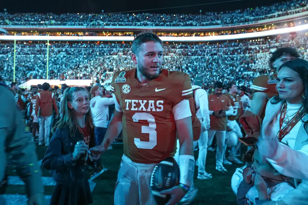 Dec 21, 2024; Austin, Texas, USA; Texas Longhorns quarterback Quinn Ewers (3) leaves the field after defeating the Clemson Tigers in the first round of the College Football Playoffs at Darrell K Royal-Texas Memorial Stadium. Mandatory Credit: Aaron E. Martinez/USA Today Network via Imagn Images