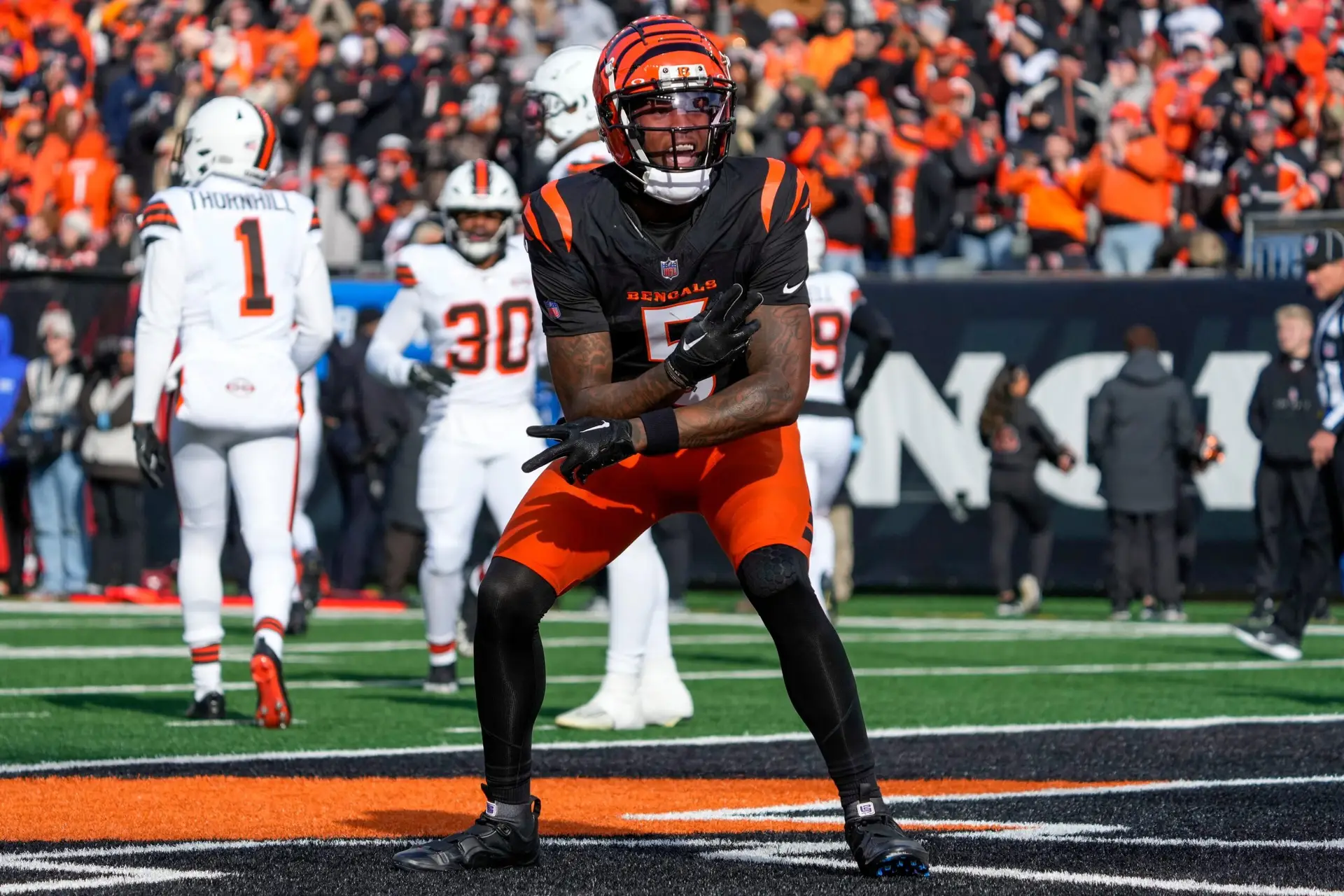 Cincinnati Bengals wide receiver Tee Higgins (5) celebrates a touchdown reception in the first quarter of the NFL Week 16 game between the Cincinnati Bengals and the Cleveland Browns at Paycor Stadium in downtown Cincinnati on Sunday, Dec. 22, 2024. The Bengals led 17-0 at halftime.