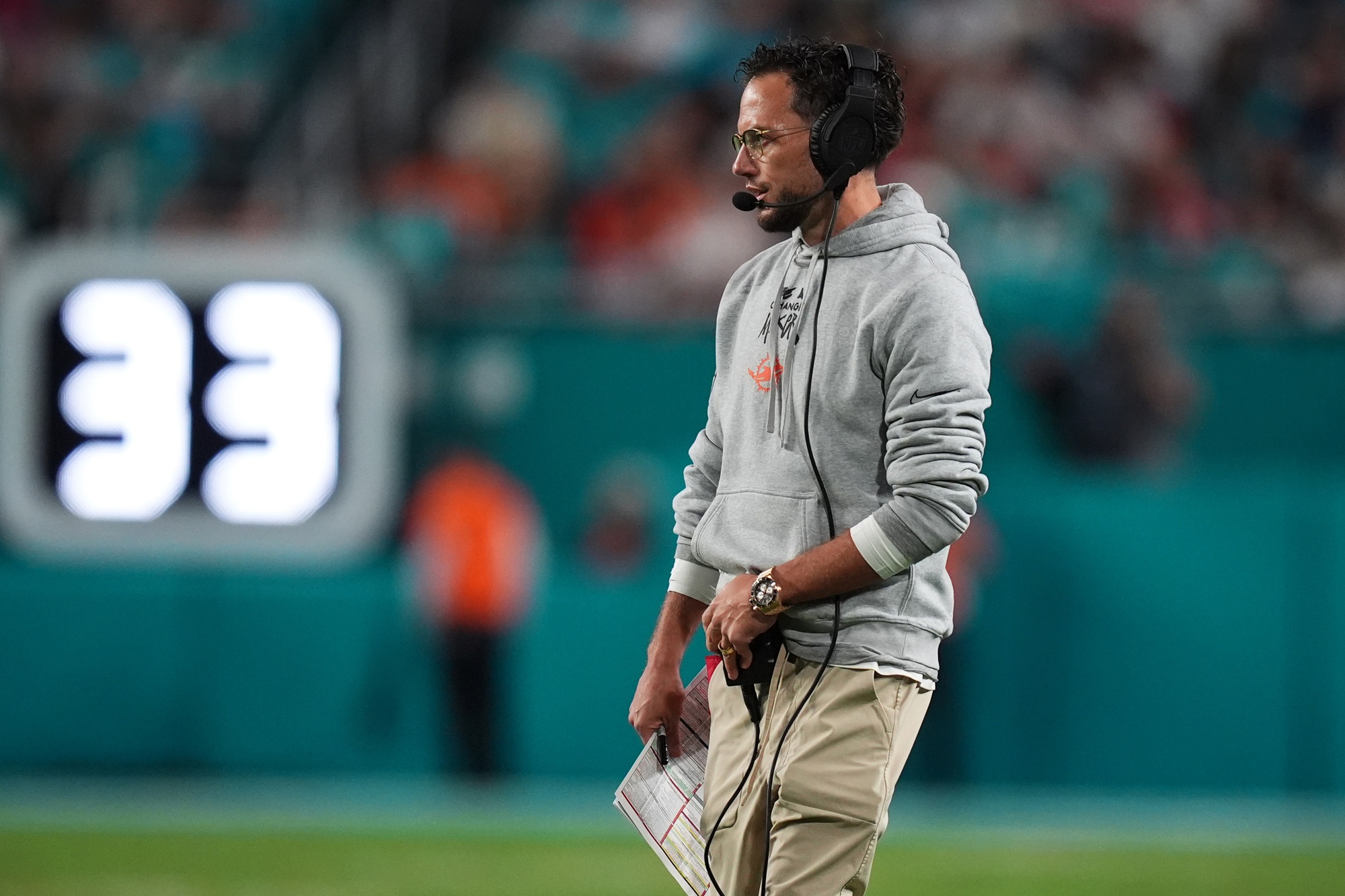 Dec 22, 2024; Miami Gardens, Florida, USA; Miami Dolphins head coach Mike McDaniel walks onto the field during second half between the Miami Dolphins and the San Francisco 49ers at Hard Rock Stadium. Mandatory Credit: Jasen Vinlove-Imagn Images