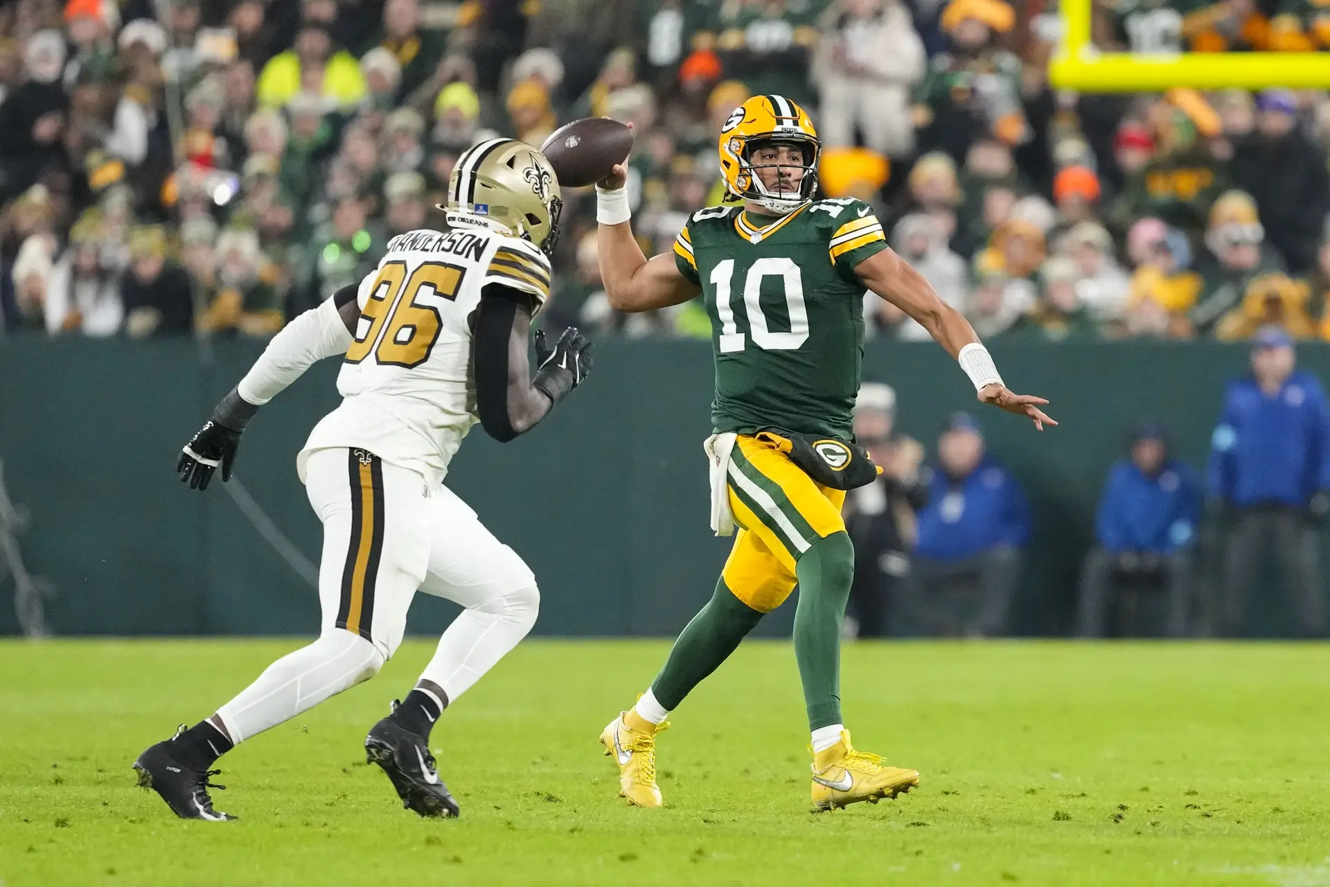 Dec 23, 2024; Green Bay, Wisconsin, USA; Green Bay Packers quarterback Jordan Love (10) throws a pass during the second quarter against the New Orleans Saints at Lambeau Field. Mandatory Credit: Jeff Hanisch-Imagn Images