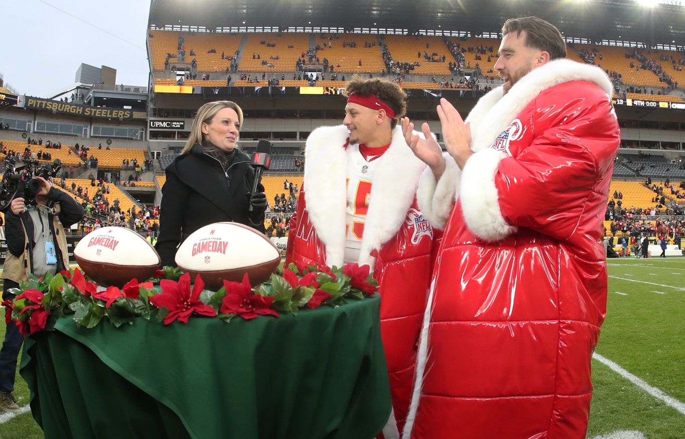 Dec 25, 2024; Pittsburgh, Pennsylvania, USA; Netflix reporter Stacey Dales (left) interviews Kansas City Chiefs quarterback Patrick Mahomes (15) and tight end Travis Kelce (87) after the Chief defeated the Pittsburgh Steelers at Acrisure Stadium. Mandatory Credit: Charles LeClaire-Imagn Images