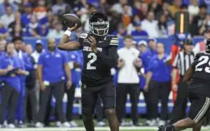 Dec 28, 2024; San Antonio, TX, USA; Colorado Buffaloes quarterback Shedeur Sanders (2) attempts a pass during the first quarter against the Brigham Young Cougars at Alamodome. Mandatory Credit: Troy Taormina-Imagn Images