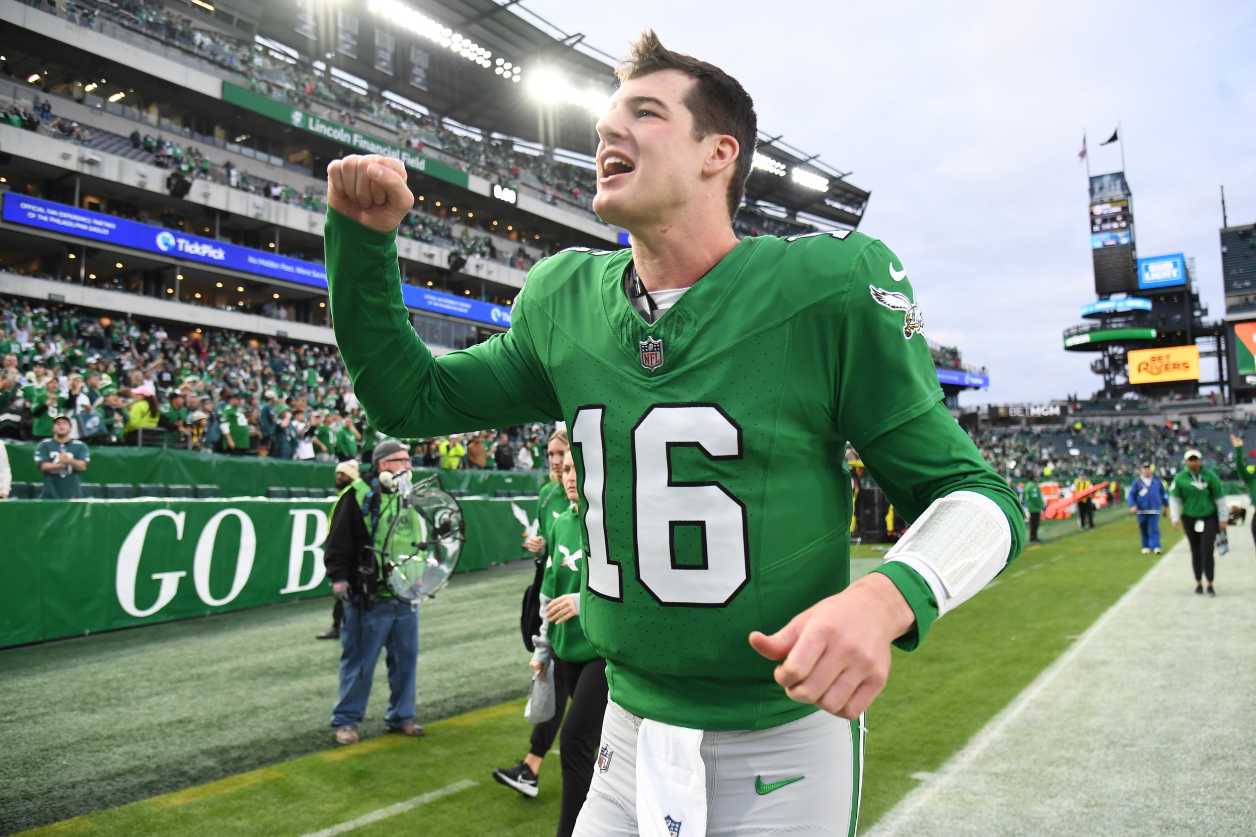 Dec 29, 2024; Philadelphia, Pennsylvania, USA; Philadelphia Eagles quarterback Tanner McKee (16) runs off the field after win against the Dallas Cowboys at Lincoln Financial Field. Mandatory Credit: Eric Hartline-Imagn Images