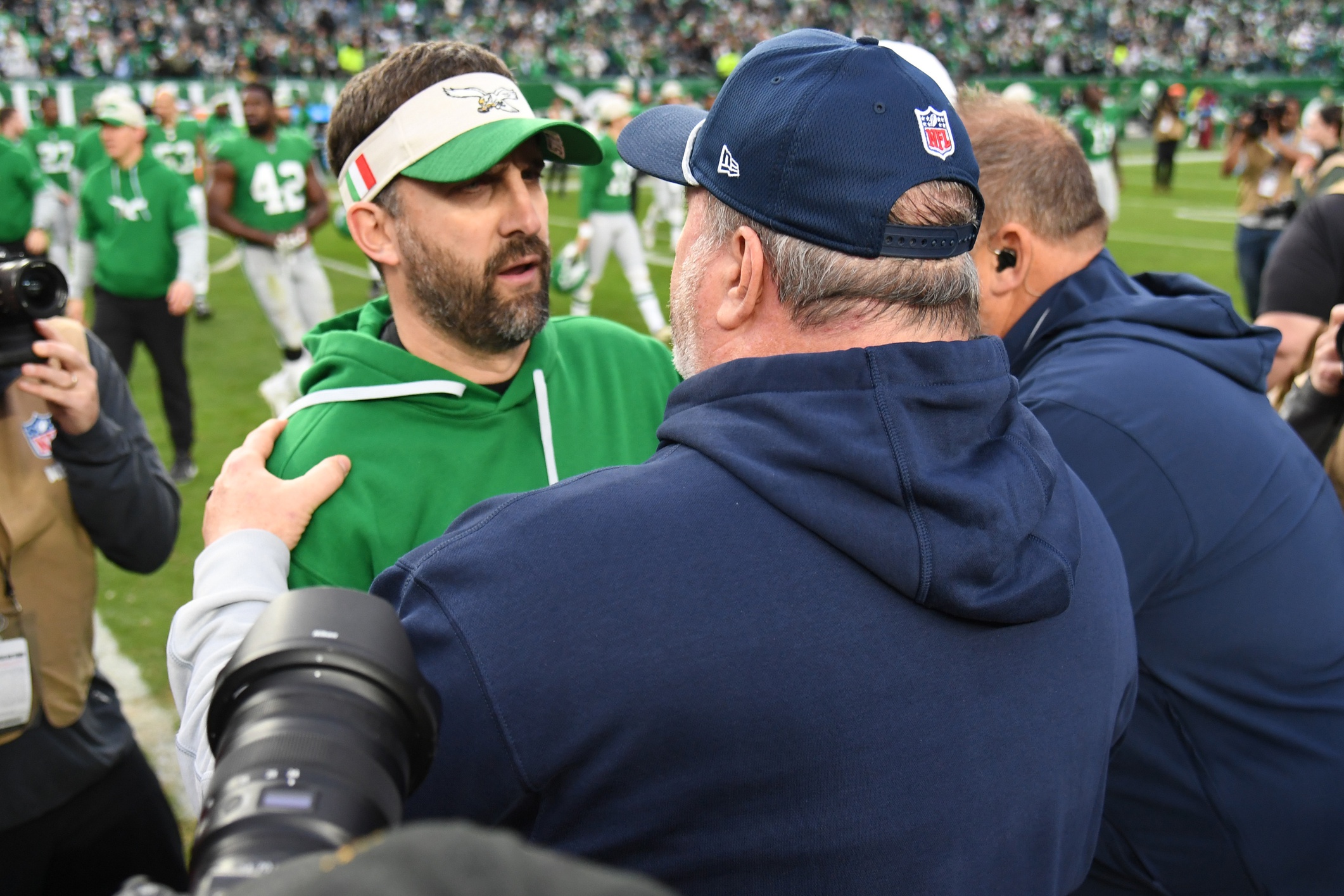 Dec 29, 2024; Philadelphia, Pennsylvania, USA; Philadelphia Eagles head coach Nick Sirianni and Dallas Cowboys head coach Mike McCarthy meet on the field after game at Lincoln Financial Field. Mandatory Credit: Eric Hartline-Imagn Images