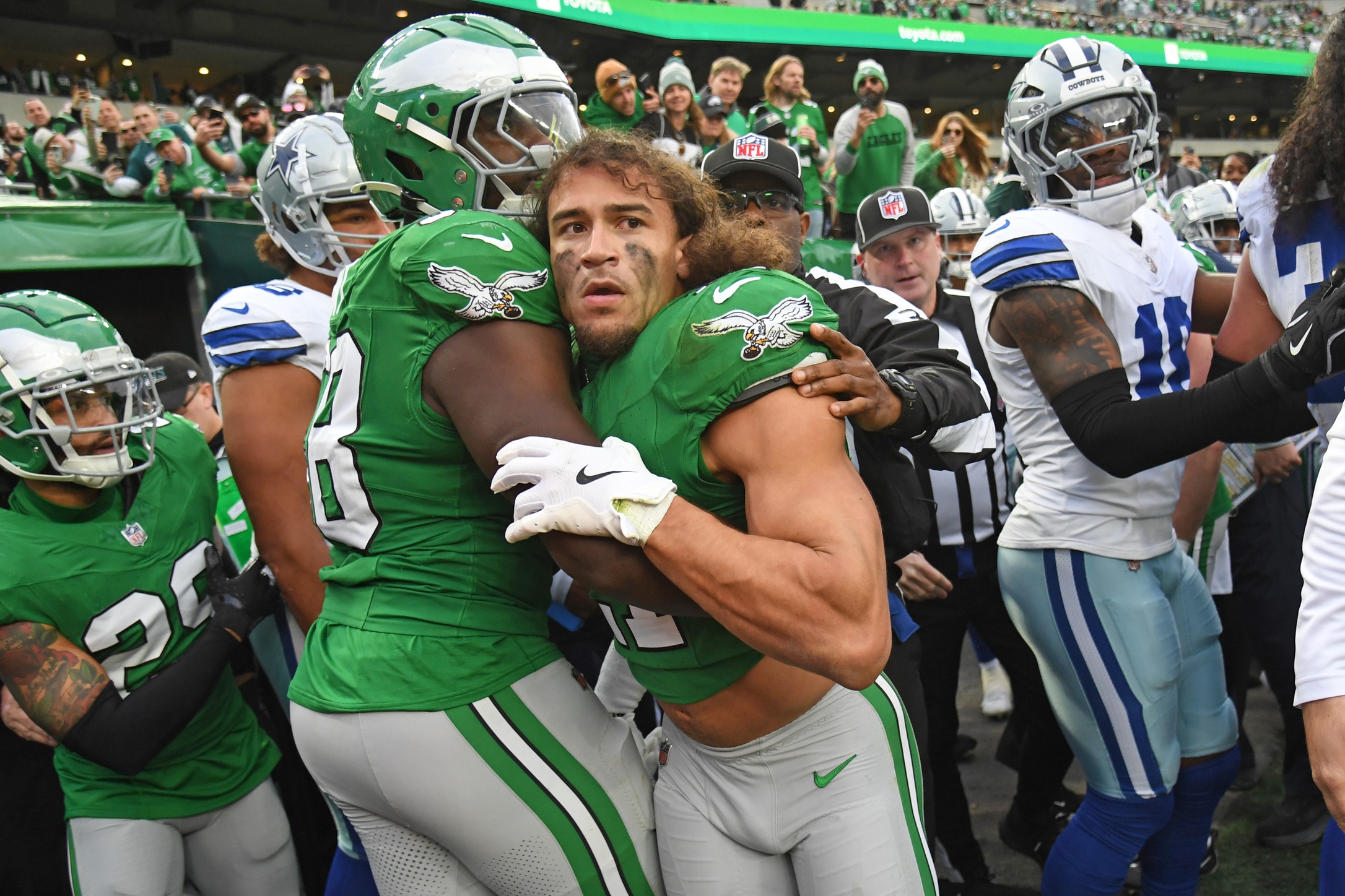 Dec 29, 2024; Philadelphia, Pennsylvania, USA; Philadelphia Eagles safety Sydney Brown (21) is held back after fight in the tunnel against the Dallas Cowboys at Lincoln Financial Field. Mandatory Credit: Eric Hartline-Imagn Images