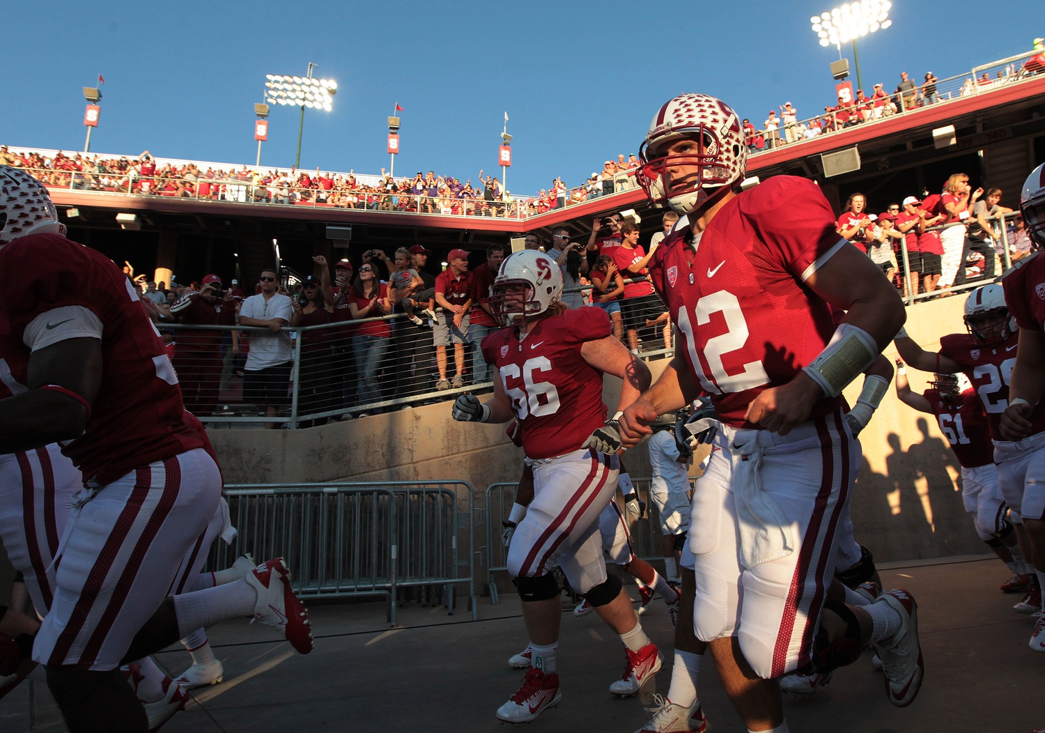 October 22, 2011; Stanford, CA, USA; Stanford Cardinal quarterback Andrew Luck (12) runs onto the field before the start of the game against the Washington Huskies at Stanford Stadium. Mandatory Credit: Cary Edmondson-Imagn Images