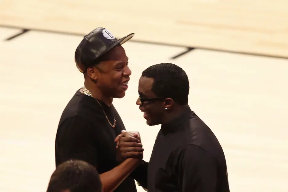 Feb 17, 2013; Houston, TX, USA; Recording artists Jay-Z (left) Sean Combs shake hands before the 2013 NBA All-Star Game at the Toyota Center. Mandatory Credit: Brett Davis-USA TODAY Sports NFL