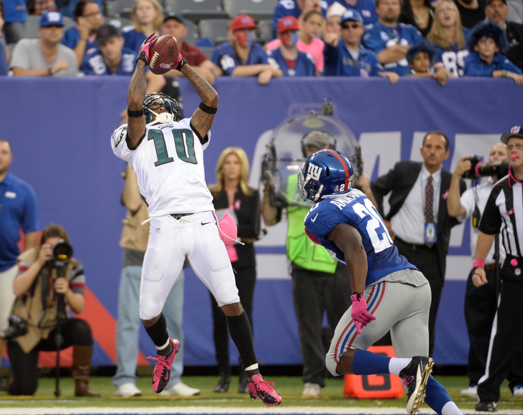 Oct 6, 2013; East Rutherford, NJ, USA; Philadelphia Eagles wide receiver DeSean Jackson (10) catches a touchdown pass over New York Giants cornerback Prince Amukamara (20) in the fourth quarter during the game at MetLife Stadium. Mandatory Credit: Robert Deutsch-Imagn Images