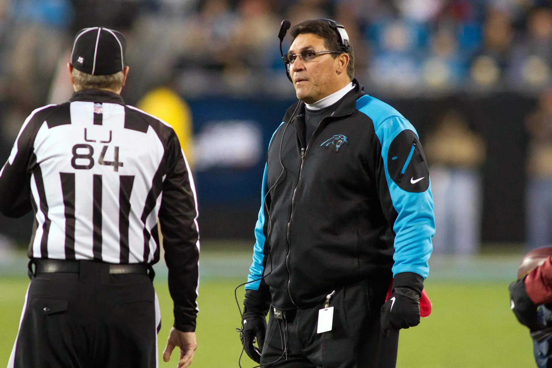 Dec 15, 2013; Charlotte, NC, USA; Carolina Panthers head coach Ron Rivera talks with an official during the second quarter against the New York Jets at Bank of America Stadium. Mandatory Credit: Jeremy Brevard-Imagn Images