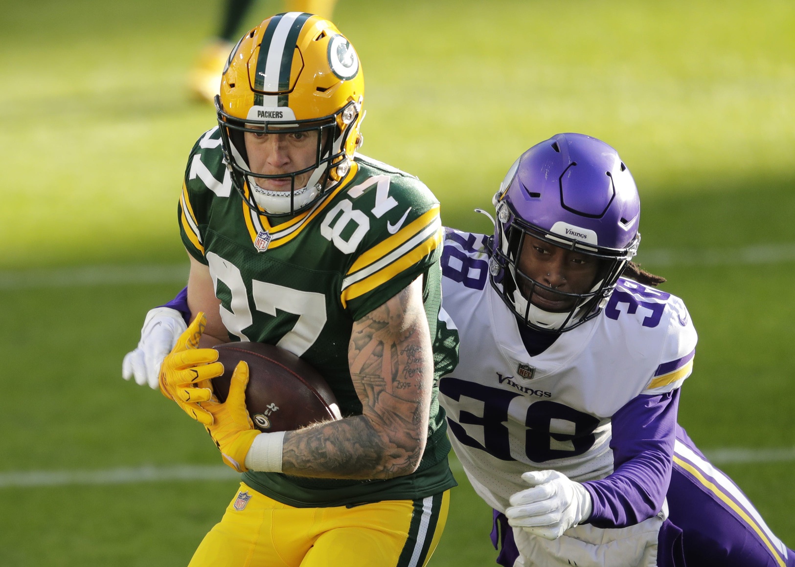 Green Bay Packers tight end Jace Sternberger (87) pulls down a long reception against Minnesota Vikings cornerback Harrison Hand (38) in the fourth quarter during their football game Sunday, November 1, 2020, at Lambeau Field in Green Bay, Wis.