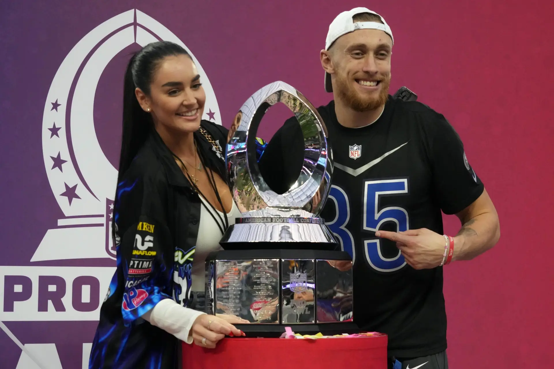 "4 More Baby": George Kittle's Wife Claire Reacts To 49ers Contract Extension 1 George Kittle of the San Francisco 49ers (85) and wife Claire Kittle pose with trophy