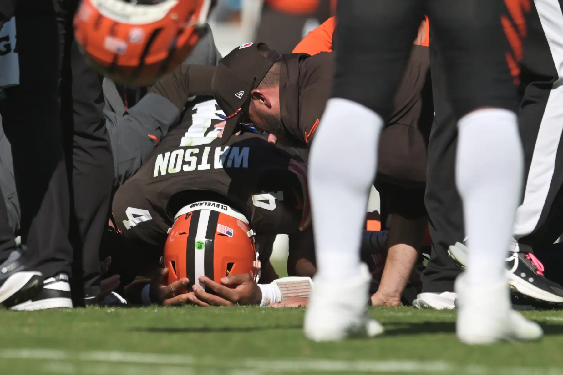 Cleveland Browns Deshaun Watson (4) lies on the ground after being injured