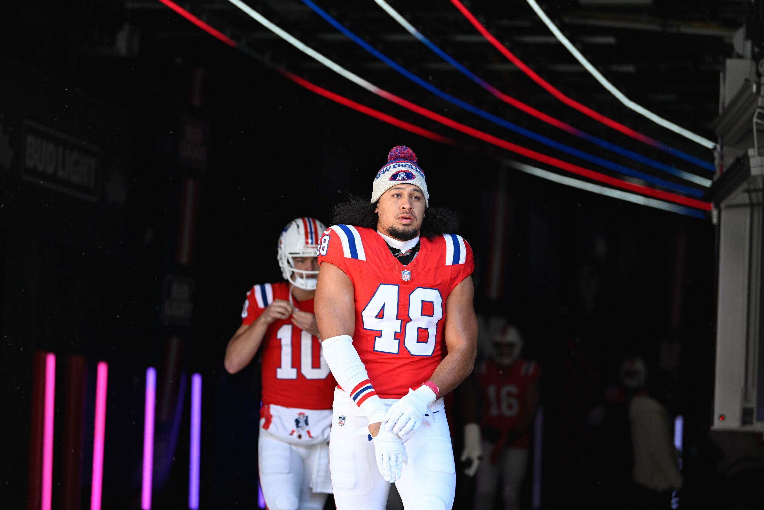 Dec 1, 2024; Foxborough, Massachusetts, USA; New England Patriots linebacker Jahlani Tavai (48) walks out of the player's tunnel before a game against the Indianapolis Colts at Gillette Stadium. Mandatory Credit: Eric Canha-Imagn Images