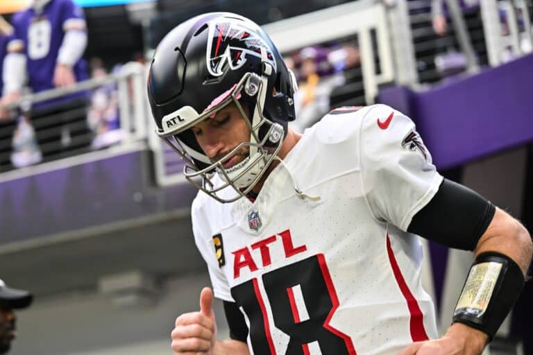 Dec 8, 2024; Minneapolis, Minnesota, USA; Atlanta Falcons quarterback Kirk Cousins (18) enters the field before the game against the Minnesota Vikings at U.S. Bank Stadium. Mandatory Credit: Jeffrey Becker-Imagn Images