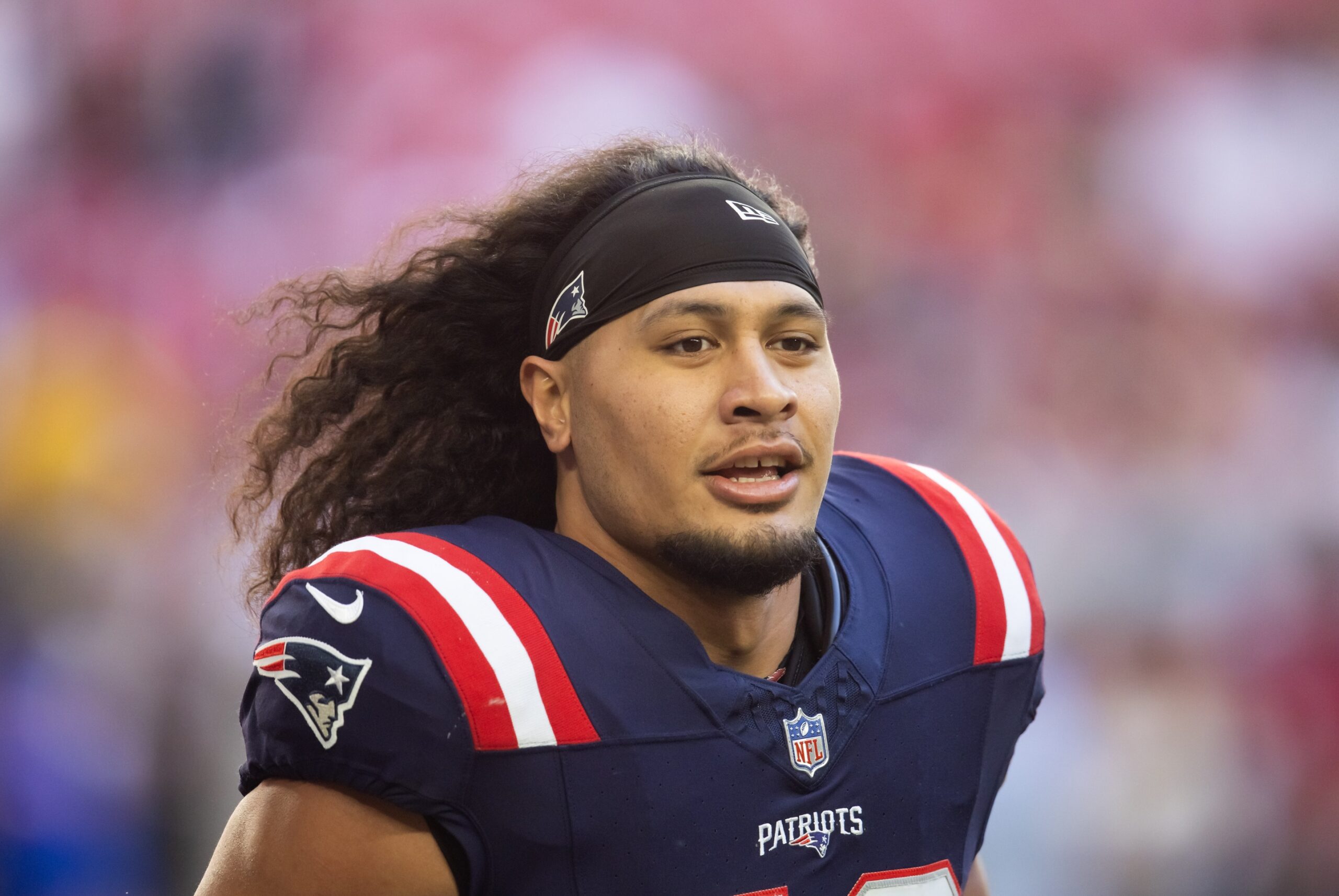 Dec 15, 2024; Glendale, Arizona, USA; New England Patriots linebacker Jahlani Tavai (48) against the Arizona Cardinals at State Farm Stadium. Mandatory Credit: Mark J. Rebilas-Imagn Images