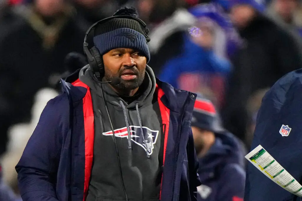 Dec 22, 2024; Orchard Park, New York, USA; New England Patriots heac coach Jerod Mayo looks on from the sideline during the first half against the Buffalo Bills at Highmark Stadium. Mandatory Credit: Gregory Fisher-Imagn Images