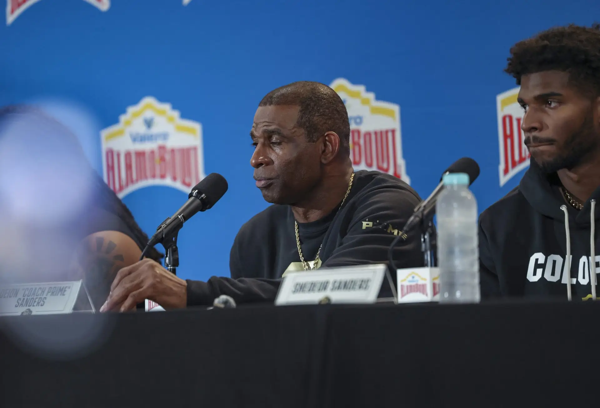 "Pretty Sure You Can’t Do This" Colorado Buffaloes Facing Massive Recruiting Violation Accusations After Recruit Posts Video Online (Watch) 3 Dec 28, 2024; San Antonio, TX, USA; Colorado Buffaloes head coach Deion Sanders talks with the media after the game against the Brigham Young Cougars at Alamodome. Mandatory Credit: Troy Taormina-Imagn Images