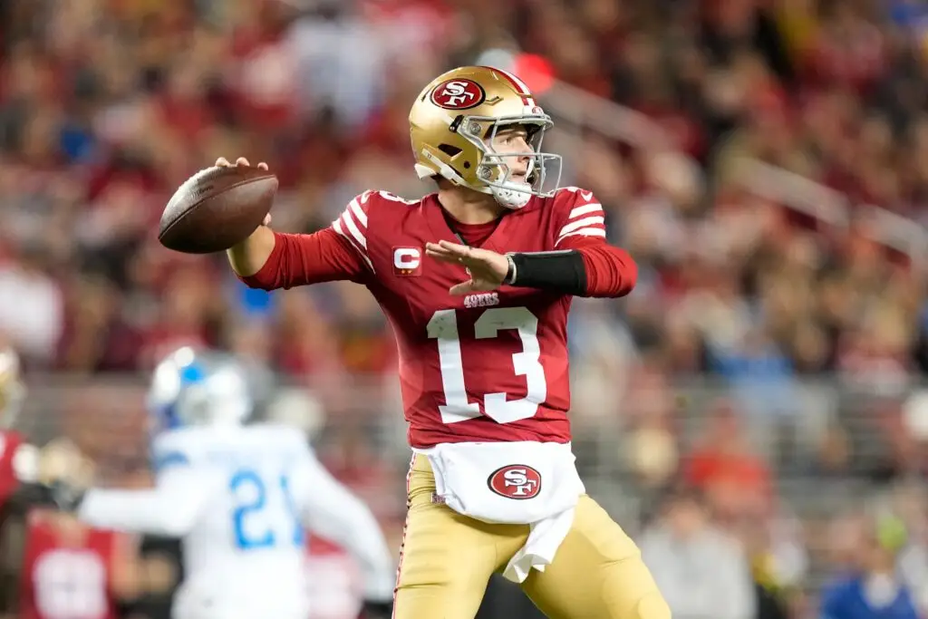 December 30, 2024; Santa Clara, California, USA; San Francisco 49ers quarterback Brock Purdy (13) passes the football against the Detroit Lions during the first quarter at Levi's Stadium. Mandatory Credit: Kyle Terada-Imagn Images