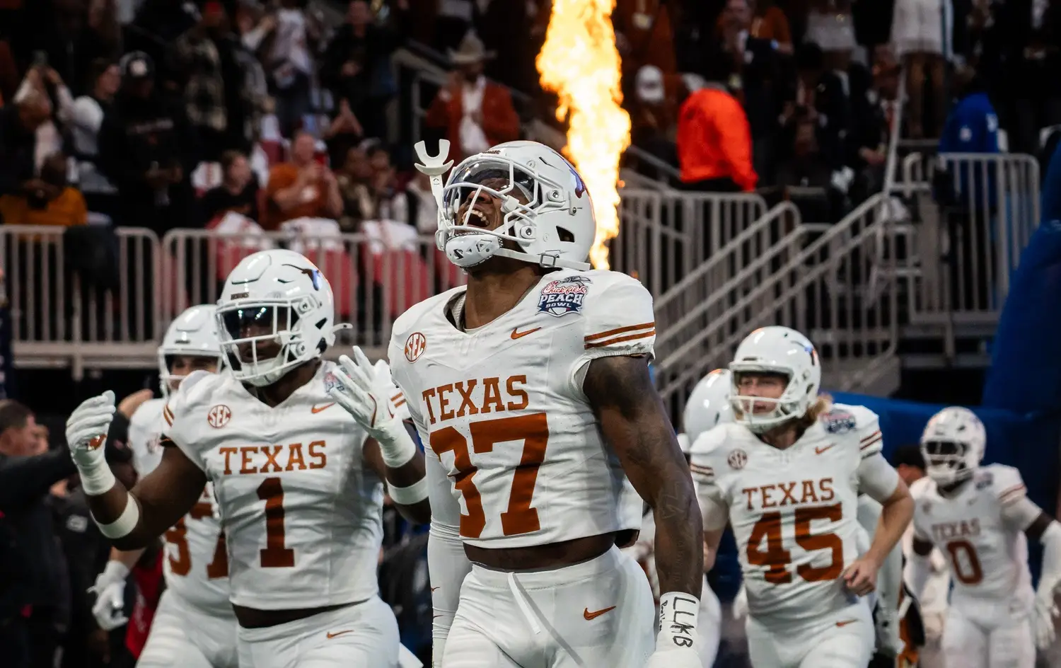 Texas Longhorns linebacker Morice Blackwell Jr. (37) runs out with his team