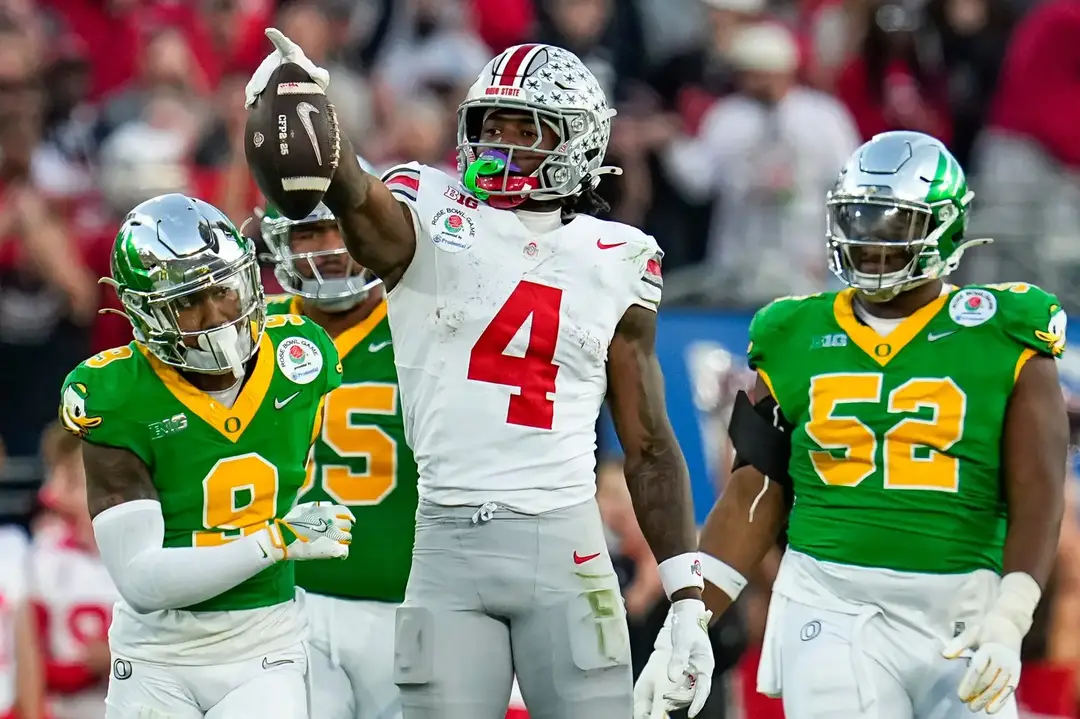 Ohio State Buckeyes wide receiver Jeremiah Smith (4) celebrates a first down catch