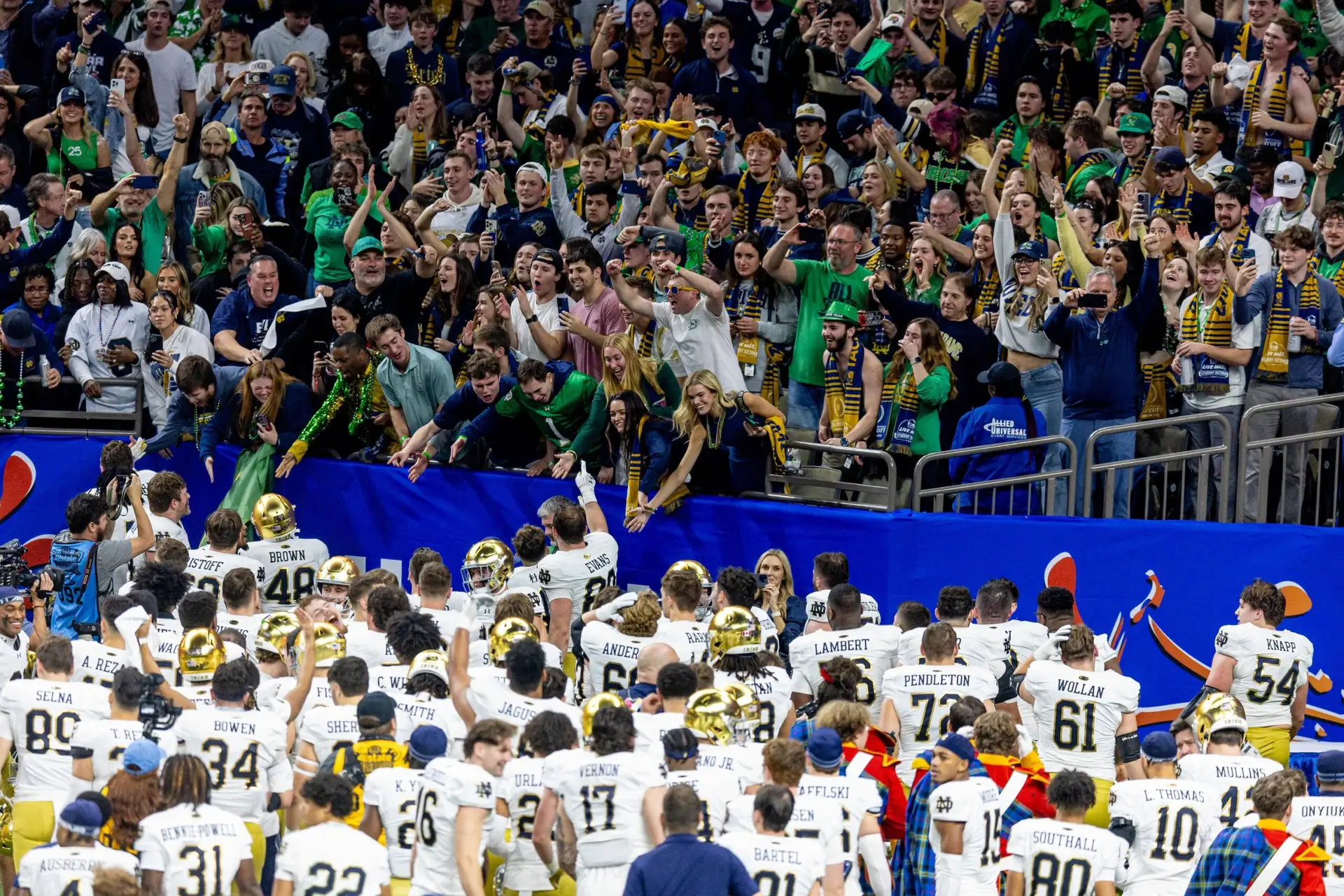 Jan 2, 2025; New Orleans, LA, USA; Notre Dame Fighting Irish celebrate with their fans after defeating the Georgia Bulldogs at Caesars Superdome. Mandatory Credit: Stephen Lew-Imagn Images