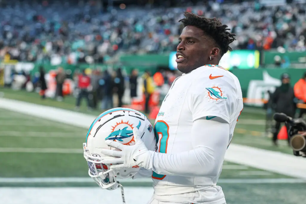 Jan 5, 2025; East Rutherford, New Jersey, USA; Miami Dolphins wide receiver Tyreek Hill (10) on the field before the game against the New York Jets at MetLife Stadium. Mandatory Credit: Vincent Carchietta-Imagn Images