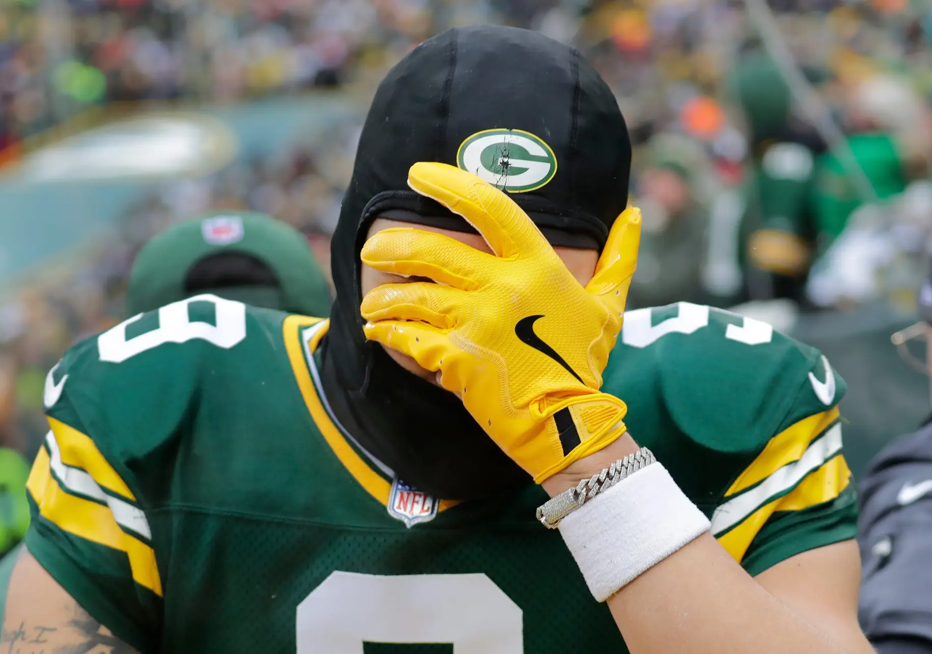 Green Bay Packers wide receiver Christian Watson (9) leaves the field on a cart after getting injured against the Chicago Bears in the second quarter during their football game Sunday, January 5, 2025, at Lambeau Field in Green Bay, Wisconsin. © Dan Powers/USA TODAY NETWORK-Wisconsin / USA TODAY NETWORK via Imagn Images