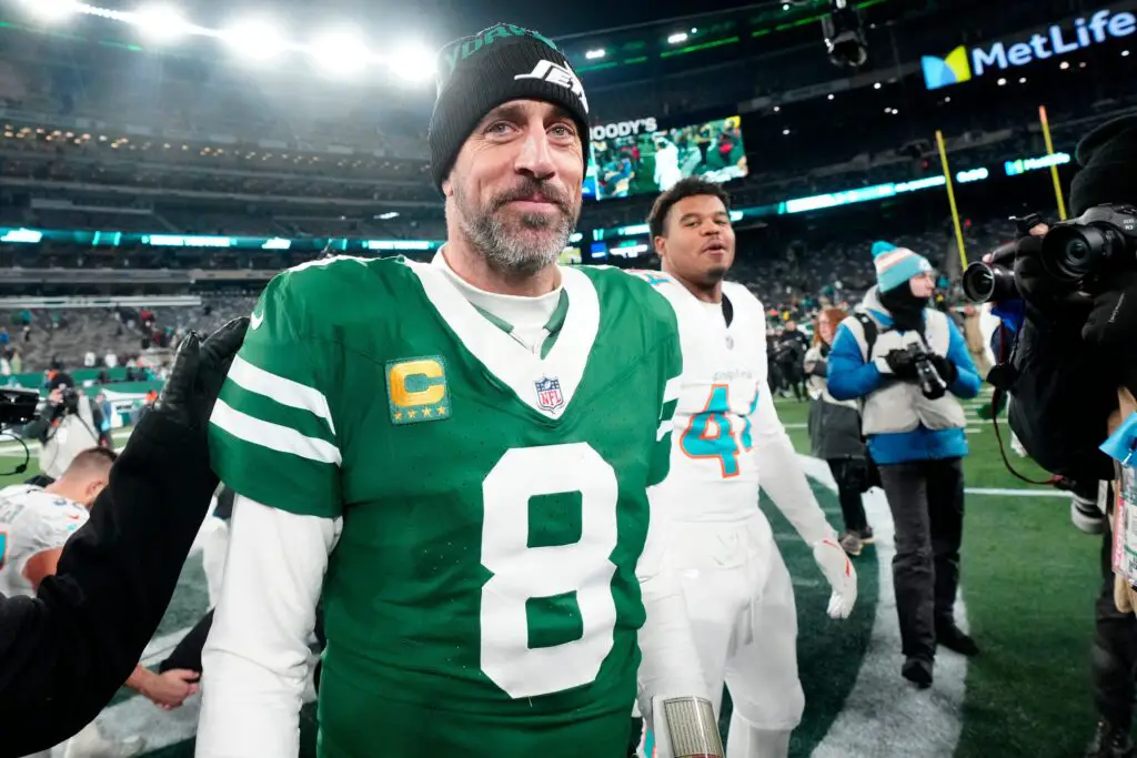 New York Jets quarterback Aaron Rodgers (8) is shown after he led Gang Green to a 32-20 victory against the Miami Dolphins, on Jan. 5, 2025, in East Rutherford, N.J. © Kevin R. Wexler / USA TODAY NETWORK via Imagn Images