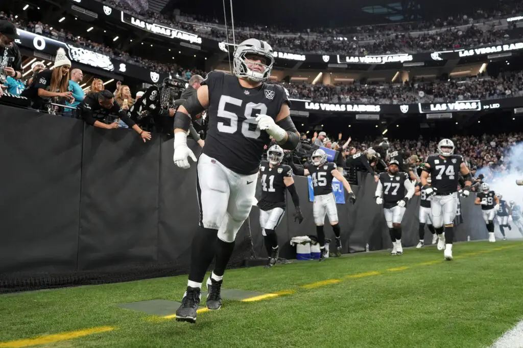 Las Vegas Raiders And Promising Wide Receiver Appear To Have Contract Dispute 3 Las Vegas Raiders guard Jackson Powers-Johnson (58) enters the field before the game against the Jacksonville Jaguars at Allegiant Stadium.