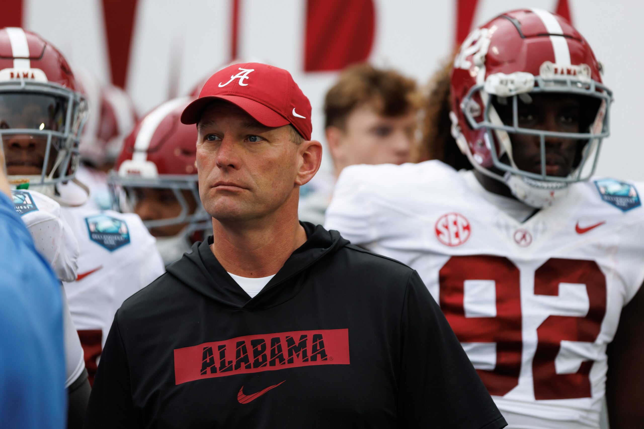 Alabama Crimson Tide head coach Kalen DeBoer looks on before running onto the field