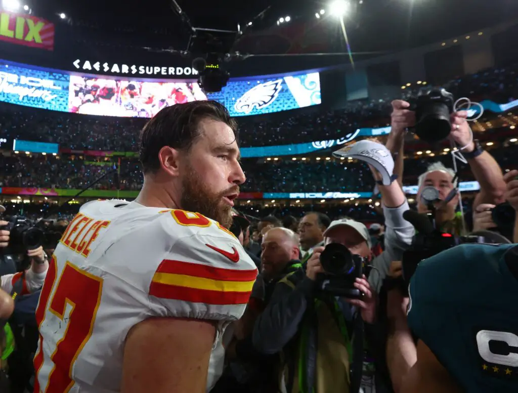 Feb 9, 2025; New Orleans, LA, USA; Kansas City Chiefs tight end Travis Kelce (87) reacts on the field after losing to the Philadelphia Eagles in Super Bowl LIX at Ceasars Superdome. Mandatory Credit: Mark J. Rebilas-Imagn Images