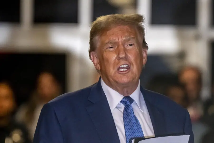 May 20, 2024, New York, NY, USA; Former President Donald Trump with his lawyers talks to the press pool outside Manhattan Criminal Court room during a trial in New York, New York, on May 20, 2024. Trump faces 34 counts of falsifying business records related to the hush money payment to adult film actress Stormy Daniels. He has pleaded not guilty and denied a relationship with Daniels. Mandatory Credit: Mark Peterson/Pool via USA TODAY