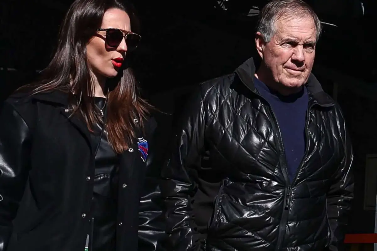 Oct 26, 2024; East Rutherford, New Jersey, USA; Former New England Patriots head coach Bill Belichick and girlfriend Jordon Hudson enter the field before the game between the Notre Dame Fighting Irish and the Navy Midshipmen at MetLife Stadium. Mandatory Credit: Vincent Carchietta-Imagn Images