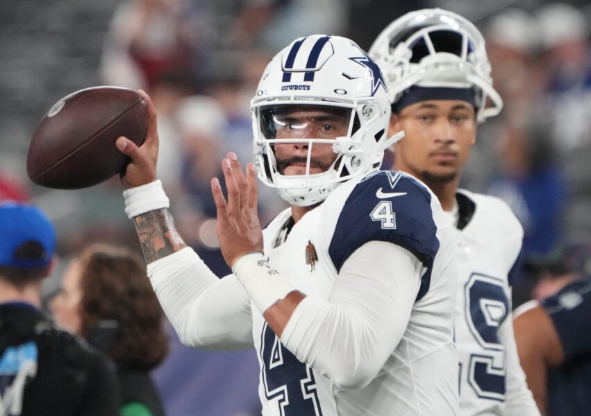 Sep 26, 2024; East Rutherford, New Jersey, USA; Dallas Cowboys quarterback Dak Prescott (4) and quarterback Trey Lance (19) before the game against the New York Giants at MetLife Stadium. Mandatory Credit: Robert Deutsch-Imagn Images